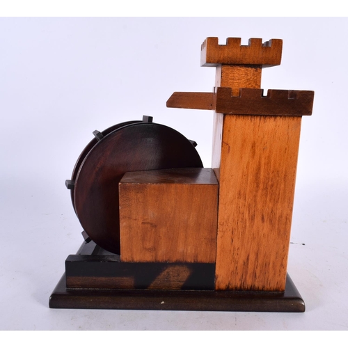 420 - A CHARMING TREEN CARVED WOOD ARCHITECTURAL DESK CLOCK formed as a castle turret. 18cm x 15cm.