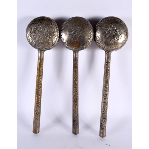 423 - THREE 19TH CENTURY INDIAN MIDDLE EASTERN SILVER LADLES decorated with motifs and foliage. 370 grams.... 