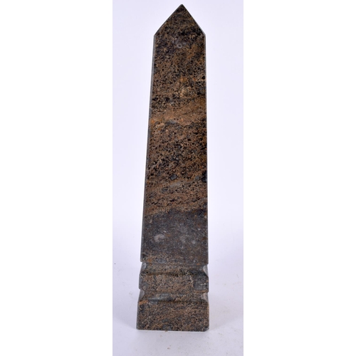 424 - AN ANTIQUE COUNTRY HOUSE POLISHED FOSSILISED MARBLE OBELISK. 26 cm high.