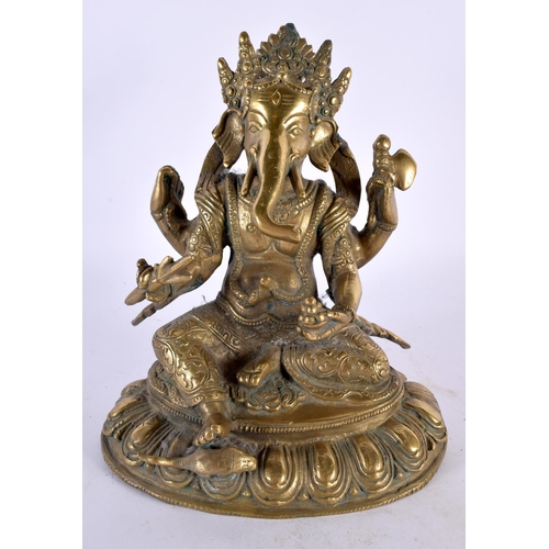 425 - A 19TH CENTURY INDIAN MIDDLE EASTERN BRONZE FIGURE OF GANESHA modelled upon a triangular lotus base.... 