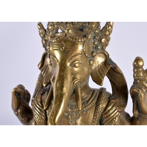 425 - A 19TH CENTURY INDIAN MIDDLE EASTERN BRONZE FIGURE OF GANESHA modelled upon a triangular lotus base.... 