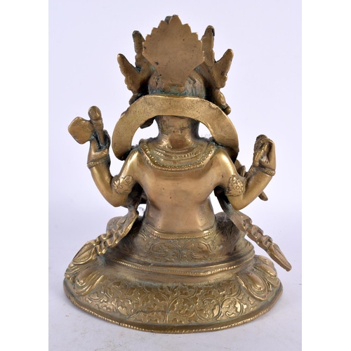 425 - A 19TH CENTURY INDIAN MIDDLE EASTERN BRONZE FIGURE OF GANESHA modelled upon a triangular lotus base.... 