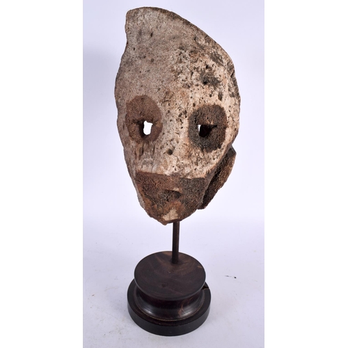 432 - AN EARLY INUIT NORTH AMERICAN CARVED TRIBAL WHALE BONE MASK upon a fitted hardwood frame. 32 cm x 12... 