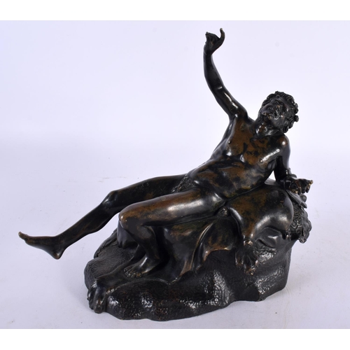 434 - A 19TH CENTURY ITALIAN GRAND TOUR BRONZE FIGURE OF A DRUNKEN MALE modelled reclining upon a naturali... 