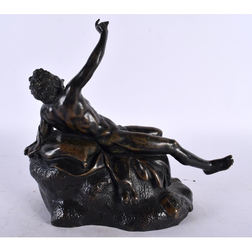 434 - A 19TH CENTURY ITALIAN GRAND TOUR BRONZE FIGURE OF A DRUNKEN MALE modelled reclining upon a naturali... 