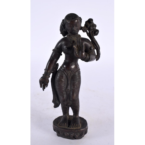 442 - A 19TH CENTURY MIDDLE EASTERN INDIAN BRONZE FIGURE OF A FEMALE DEITY modelled with one hand raised. ... 