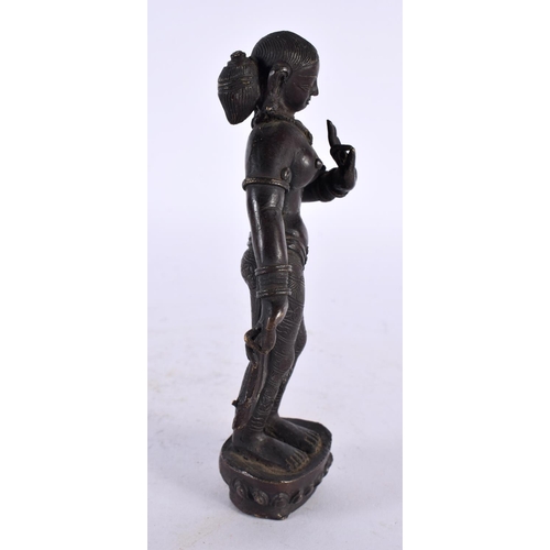 442 - A 19TH CENTURY MIDDLE EASTERN INDIAN BRONZE FIGURE OF A FEMALE DEITY modelled with one hand raised. ... 