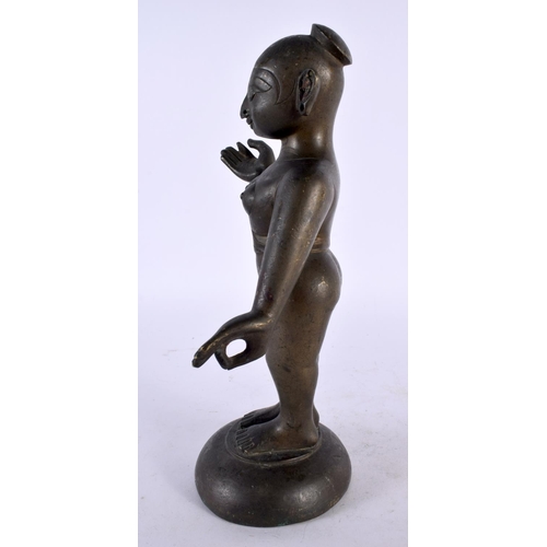 445 - A LOVELY 18TH CENTURY INDIAN BRONZE FIGURE OF A STANDING DEITY modelled nude with one hand raised. 2... 