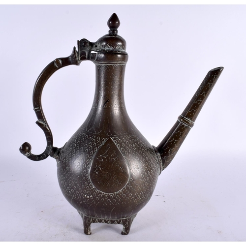 446 - A LARGE 18TH CENTURY MIDDLE EASTERN MUGHAL BRONZE EWER decorated all over with foliage, tear drop pa... 