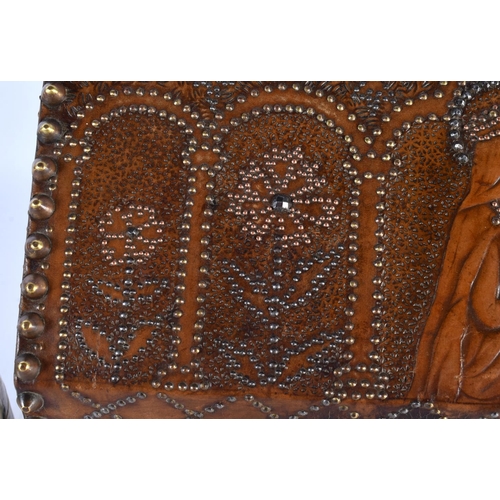 447 - A LOVELY 19TH CENTURY ARTS AND CRAFTS LEATHER WOOD AND STUD WORK CASKET decorated with Religious fig... 