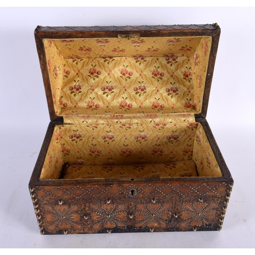 447 - A LOVELY 19TH CENTURY ARTS AND CRAFTS LEATHER WOOD AND STUD WORK CASKET decorated with Religious fig... 