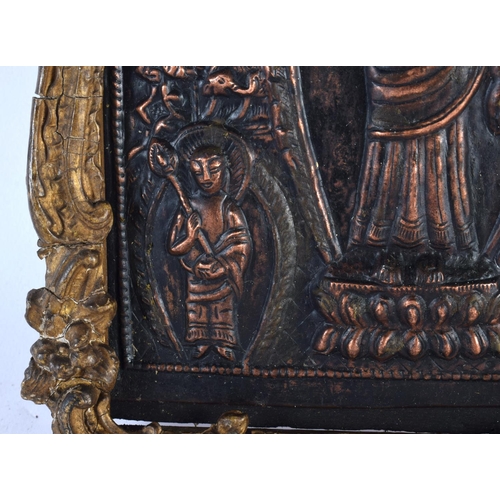 449 - A 19TH CENTURY MIDDLE EASTERN ASIAN REPOUSSE BUDDHISTIC PANEL depicting buddha's, encased within a g... 