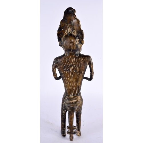 450 - A LARGE 19TH CENTURY AFRICAN TRIBAL BRONZE FIGURE OF A WOLF MUSICIAN modelled playing a pipe. 30cm h... 