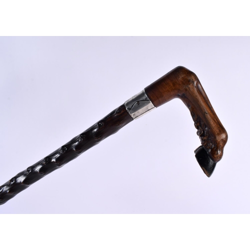 454 - AN UNUSUAL VICTORIAN CARVED WOOD HORSE HOOF WALKING CANE with turned wood knobbled shaft. 85 cm long... 