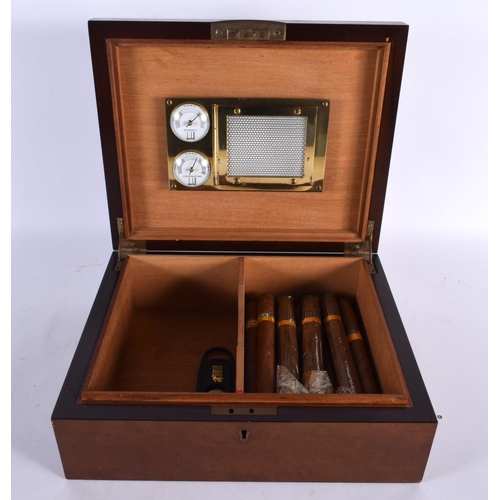 461 - A DUNHILL HUMIDOR with cigars. 30cm x 24 cm.