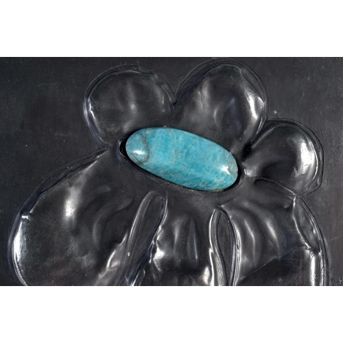 464 - A VINTAGE PEWTER AND TURQUOISE STONE BOOK COVER decorated with a flower. 28cm x 10 cm.