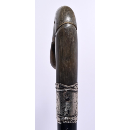 468 - A 19TH CENTURY MIDDLE EASTERN RHINOCEROS HORN CANE together with two others. 90cm long. (3)