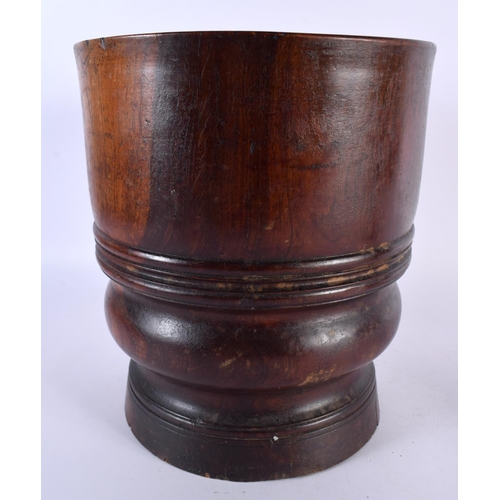 472 - A LARGE 19TH CENTURY TREEN LIGNUM VITAE HEAVY WOOD PESTLE AND MORTAR. Mortar 24 cm x 18cm. (2)