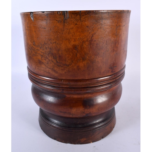 472 - A LARGE 19TH CENTURY TREEN LIGNUM VITAE HEAVY WOOD PESTLE AND MORTAR. Mortar 24 cm x 18cm. (2)