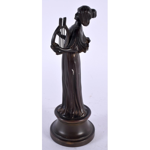 478 - AN ART DECO CONTINENTAL BRONZE FIGURE OF A FEMALE MUSICIAN. 18cm high.