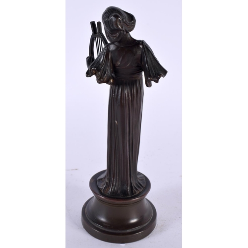 478 - AN ART DECO CONTINENTAL BRONZE FIGURE OF A FEMALE MUSICIAN. 18cm high.