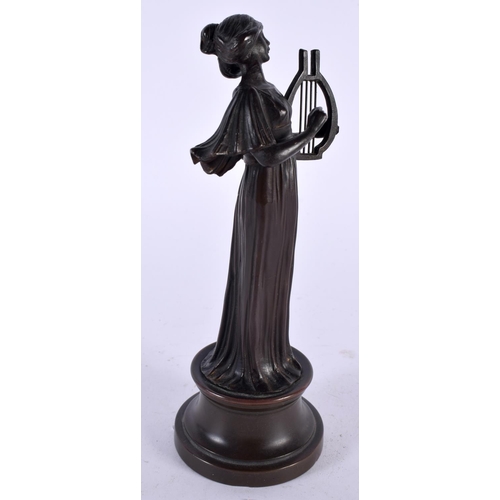 478 - AN ART DECO CONTINENTAL BRONZE FIGURE OF A FEMALE MUSICIAN. 18cm high.