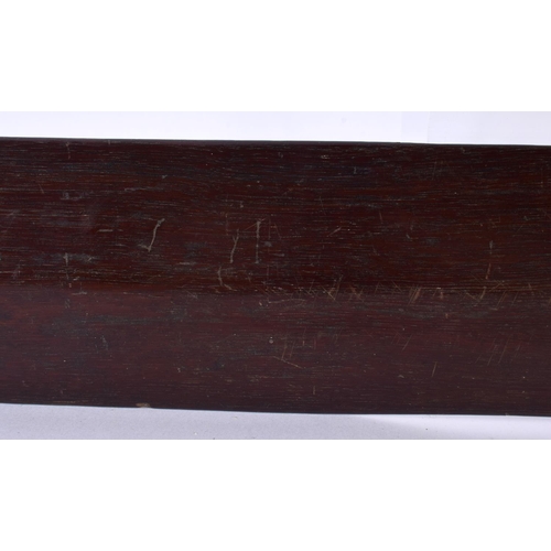 490 - AN ANTIQUE POLYNESIAN TRIBAL CARVED WOOD PADDLE CLUB inscribed with motifs. 99 cm long.