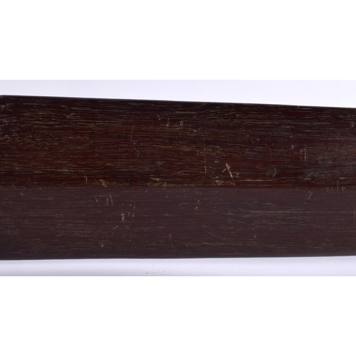 490 - AN ANTIQUE POLYNESIAN TRIBAL CARVED WOOD PADDLE CLUB inscribed with motifs. 99 cm long.