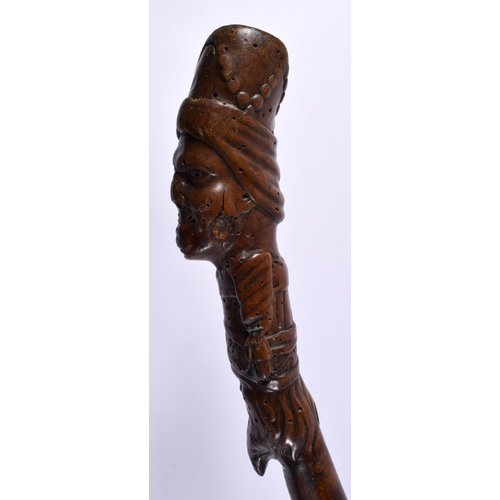 491 - AN 18TH/19TH CENTURY TURKISH OTTOMAN FIGURAL CARVED WOOD WALKING CANE. 100 cm long.