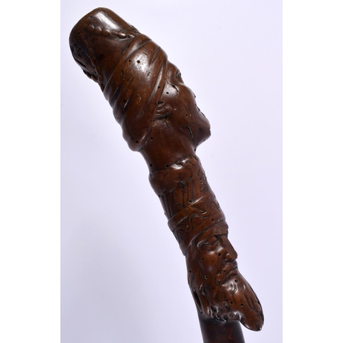 491 - AN 18TH/19TH CENTURY TURKISH OTTOMAN FIGURAL CARVED WOOD WALKING CANE. 100 cm long.