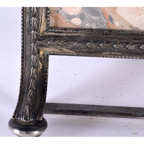 513 - AN ANTIQUE COUNTRY HOUSE SILVER PLATED EASEL FORM PHOTOGRAPH FRAME. 27 cm x 18cm.