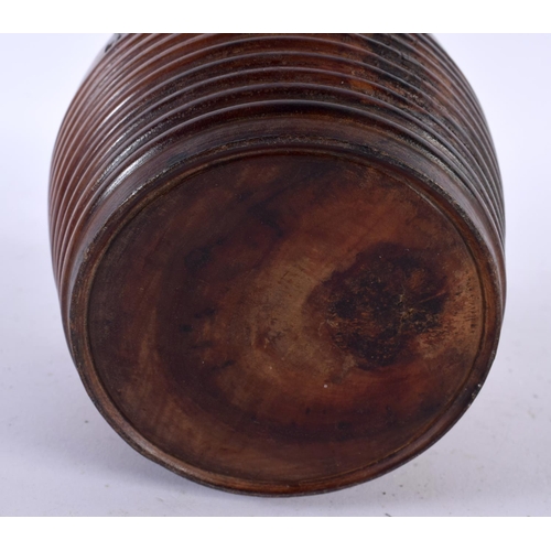 519 - A LATE 19TH CENTURY TREEN CARVED WOOD TOBACCO BOX AND COVER. 19 cm high.