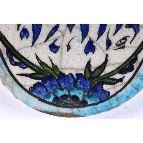 522 - A MIDDLE EASTERN FAIENCE ISLAMIC CALLIGRAPHY PANEL. 13 cm x 9 cm.