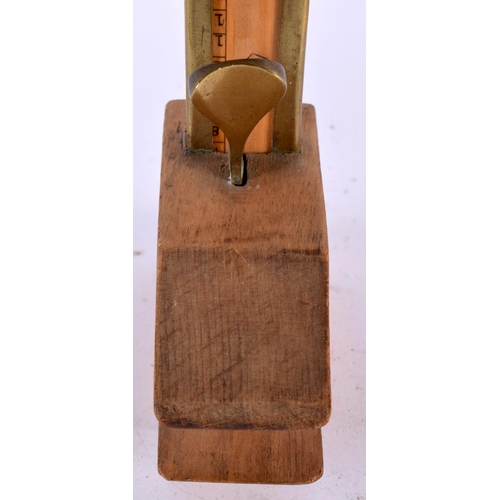 526 - A VINTAGE CARVED WOOD FOOT MEASURE. 48 cm high.