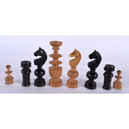 538 - A VINTAGE CARVED WOOD CHESS SET. Largest 6 cm high. (qty)