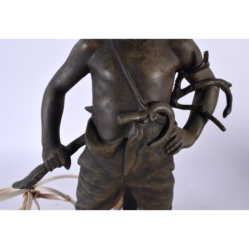 542 - A LARGE EARLY 20TH CENTURY FRENCH SPELTER FIGURAL TABLE LAMP entitled Siffleur. 64 cm high.