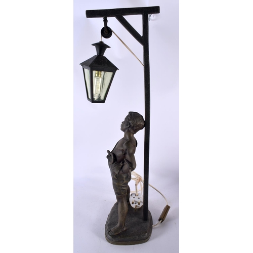 542 - A LARGE EARLY 20TH CENTURY FRENCH SPELTER FIGURAL TABLE LAMP entitled Siffleur. 64 cm high.