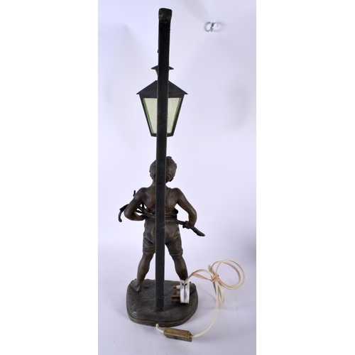 542 - A LARGE EARLY 20TH CENTURY FRENCH SPELTER FIGURAL TABLE LAMP entitled Siffleur. 64 cm high.