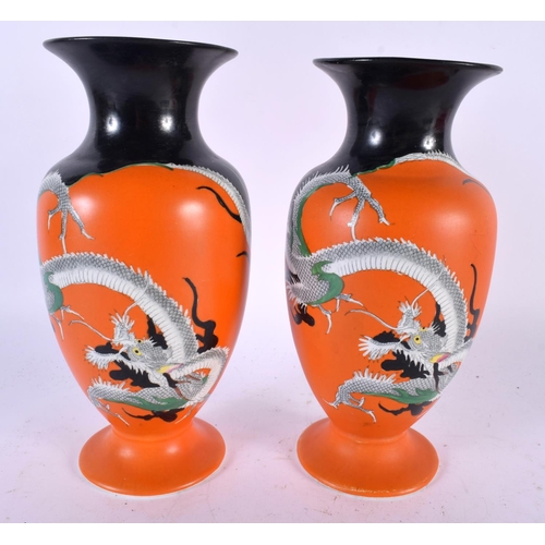 544 - A PAIR OF ART DECO ENGLISH PORCELAIN DRAGON VASES together with a book entitled 'The Children of Chi... 