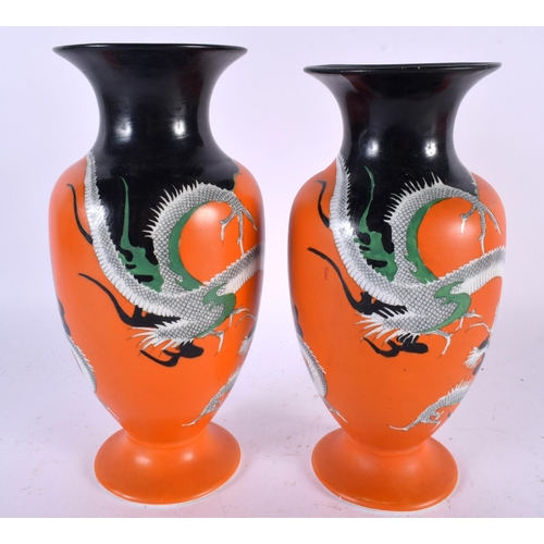 544 - A PAIR OF ART DECO ENGLISH PORCELAIN DRAGON VASES together with a book entitled 'The Children of Chi... 