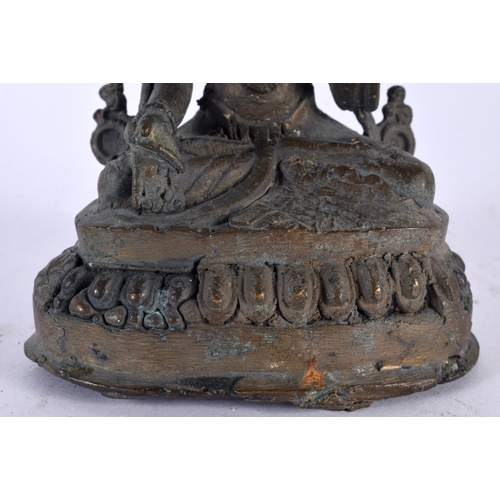 551 - A 19TH CENTURY INDIAN NEPALESE BRONZE FIGURE OF A SEATED BUDDHA modelled upon a triangular base. 13 ... 