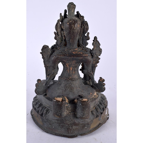 551 - A 19TH CENTURY INDIAN NEPALESE BRONZE FIGURE OF A SEATED BUDDHA modelled upon a triangular base. 13 ... 