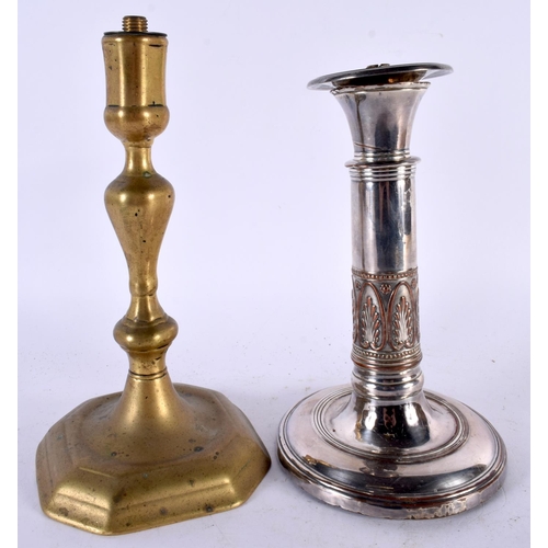 555 - TWO ANTIQUE CANDLESTICKS. Largest 21 cm high. (2)