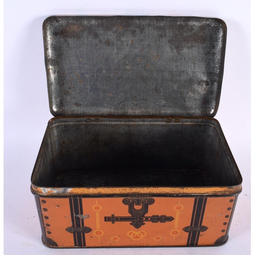 564 - AN EDWARDIAN CABIN TRUNK TIN PLATED BISCUIT TIN. 24 cm x 10 cm.