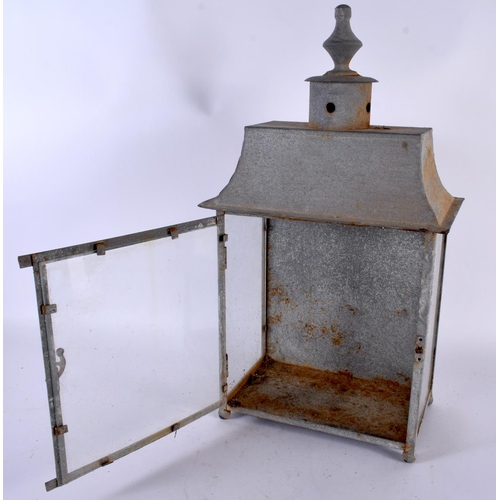 567 - A VINTAGE TOLEWARE COUNTRY HOUSE LANTERN. 45cm x 22cm.