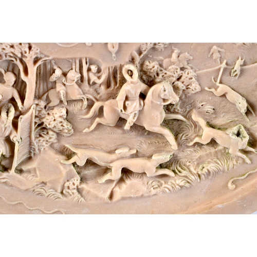 574 - A RARE EARLY 20TH CENTURY EUROPEAN LAVA STONE CARVED DISH depicting classical scenes. 20cm diameter.