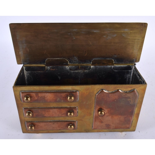 575 - AN UNUSUAL EARLY VICTORIAN WELSH COPPER AND BRASS SALT BOX formed as a cooker. 18cm x 10 cm.