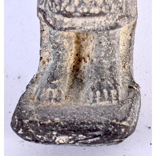 576 - AN EGYPTIAN POTTERY USHABTI. 18cm high.