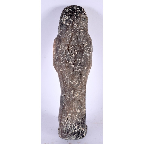 576 - AN EGYPTIAN POTTERY USHABTI. 18cm high.