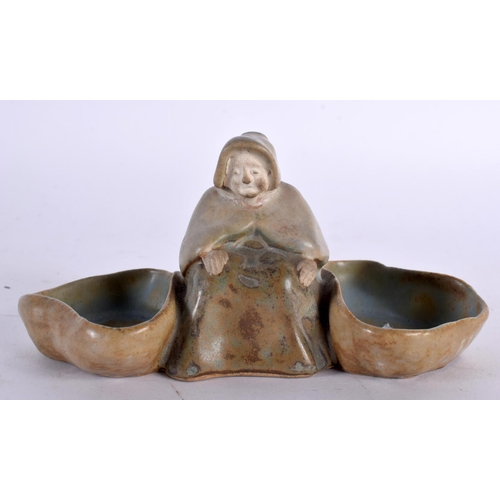 58 - A SMALL STUDIO POTTERY FIGURAL DOUBLE SALT. 14cm wide.